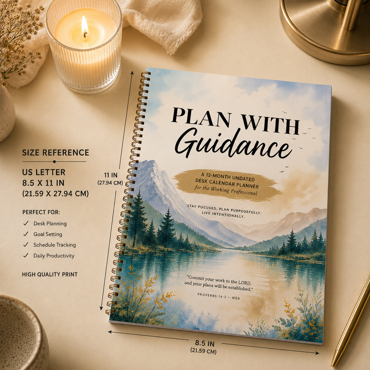 A spiral-bound desk calendar planner titled 'PLAN WITH Guidance' lies on a beige tabletop with size callouts around it. The cover shows a scenic mountain-and-water landscape with birds and a gold banner reading 'A 12 MONTH UNDATED DESK CALENDAR PLANNER for the Working Professional.